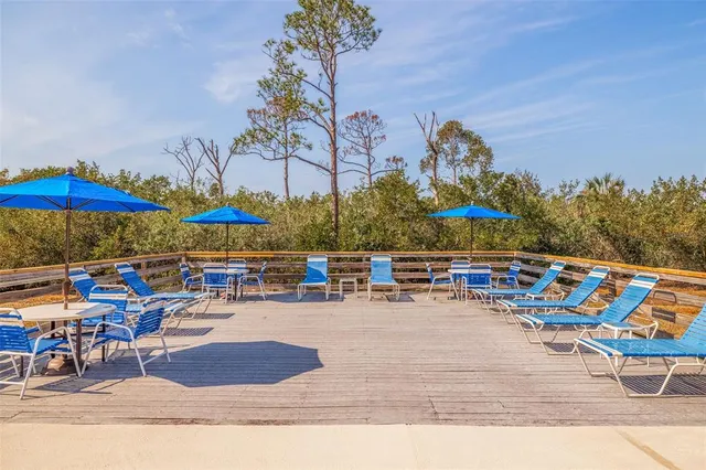 a view of a living room and dining room
