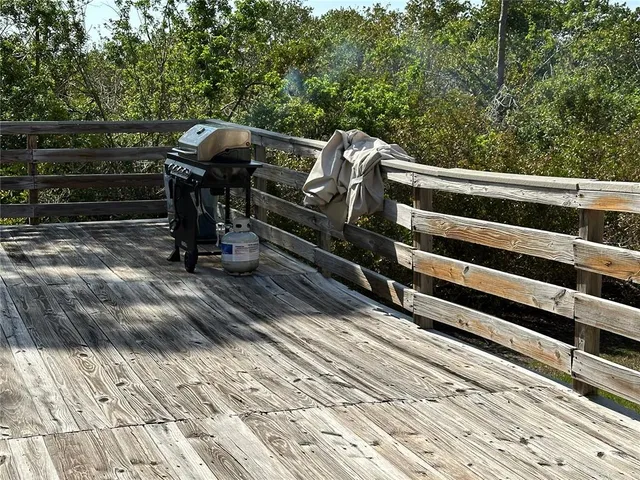 an aerial view of multiple house with a yard