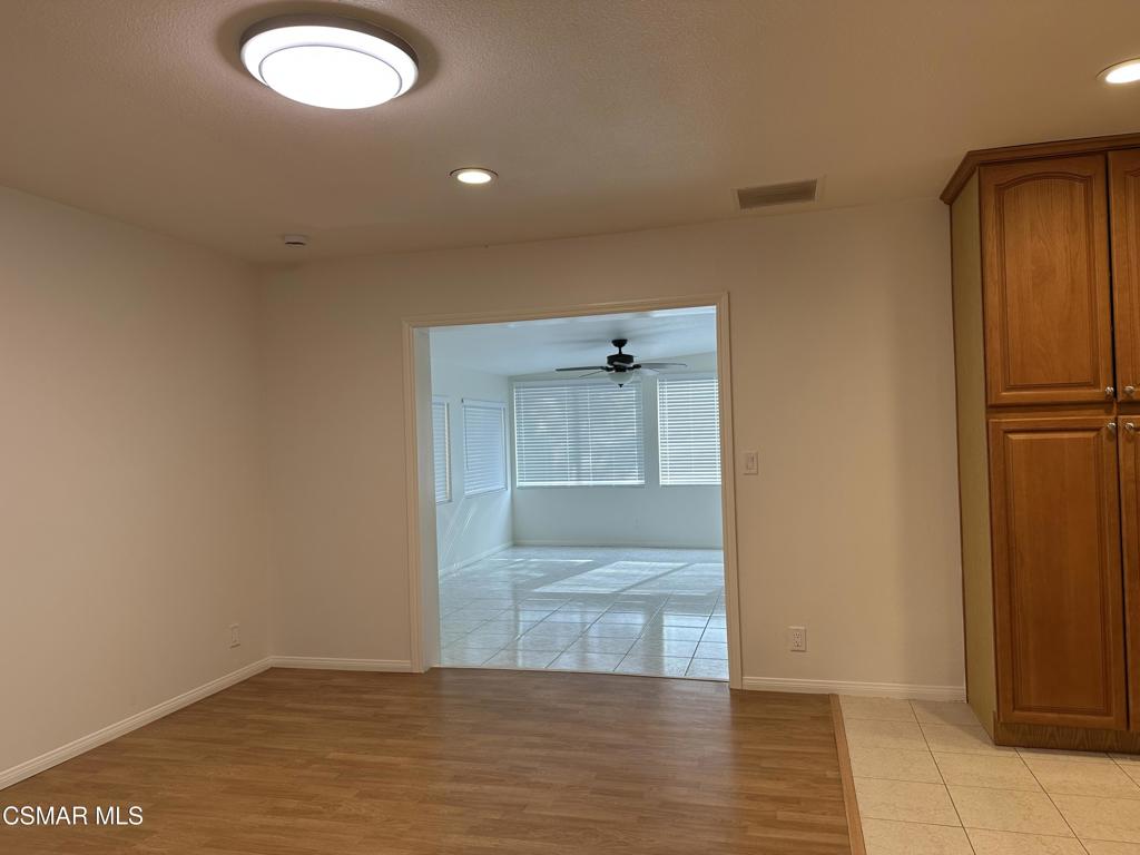 6495 Hope Street Simi Valley, CA 93063 - Photo 12 of 33 an empty room with wooden floor and closet