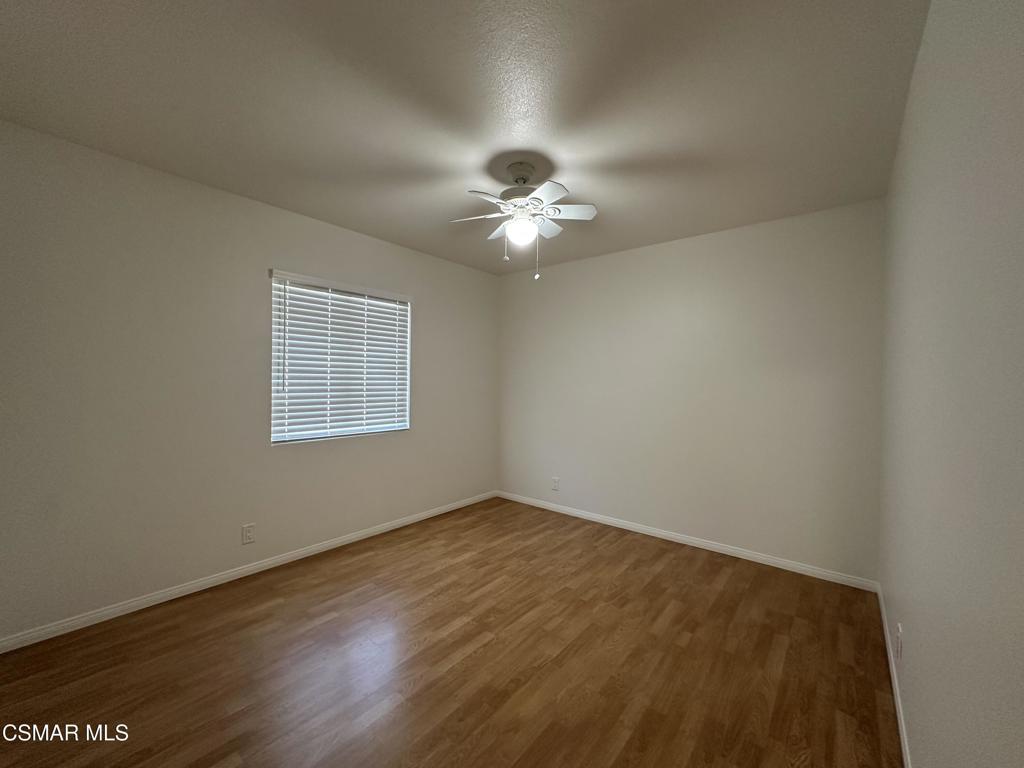 6495 Hope Street Simi Valley, CA 93063 - Photo 16 of 33 an empty room with a window and a ceiling fan