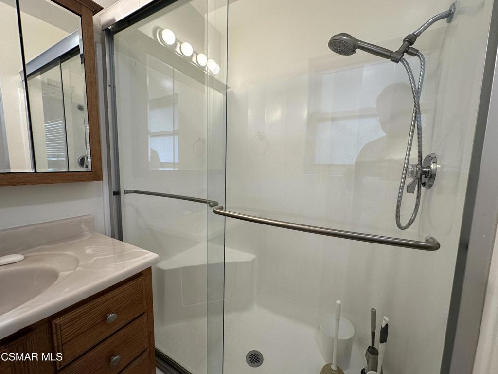 6495 Hope Street Simi Valley, CA 93063 - Photo 22 of 33 a bathroom with a shower and a sink