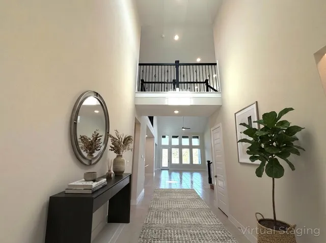 a view of a hallway with entryway