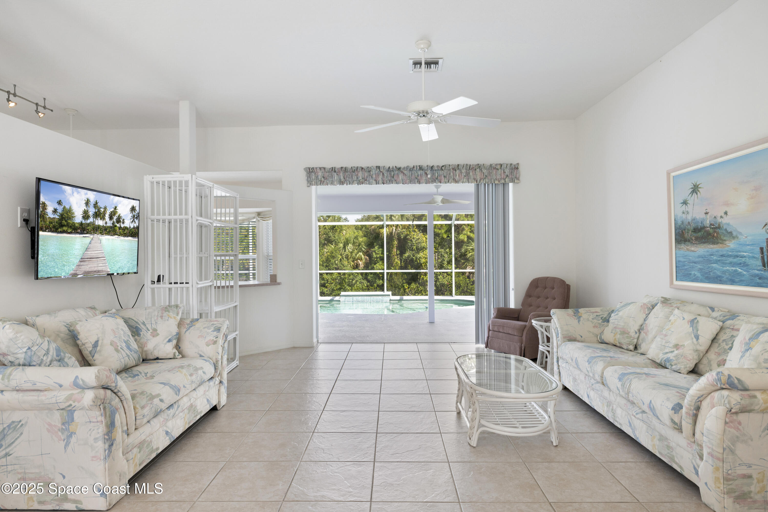 1253 George Street Sebastian, FL 32958 - Photo 13 of 37 a living room with furniture and a large window
