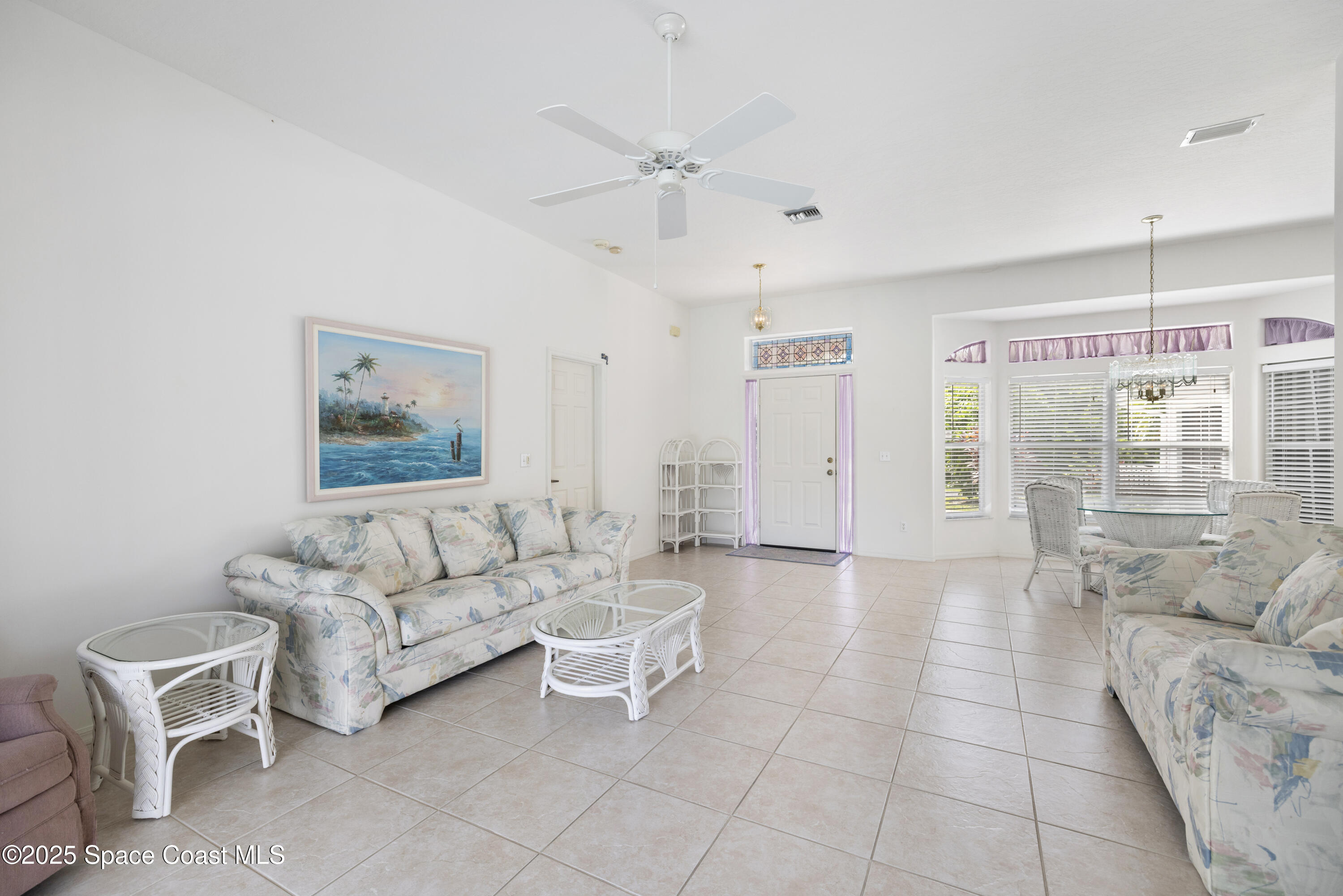 1253 George Street Sebastian, FL 32958 - Photo 14 of 37 a living room with furniture and a ceiling fan