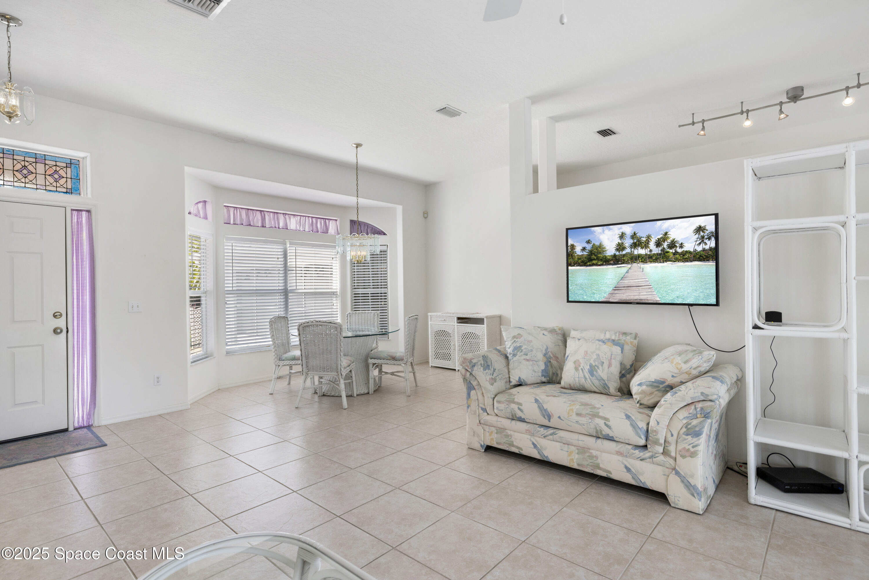 1253 George Street Sebastian, FL 32958 - Photo 15 of 37 a living room with furniture and a large window