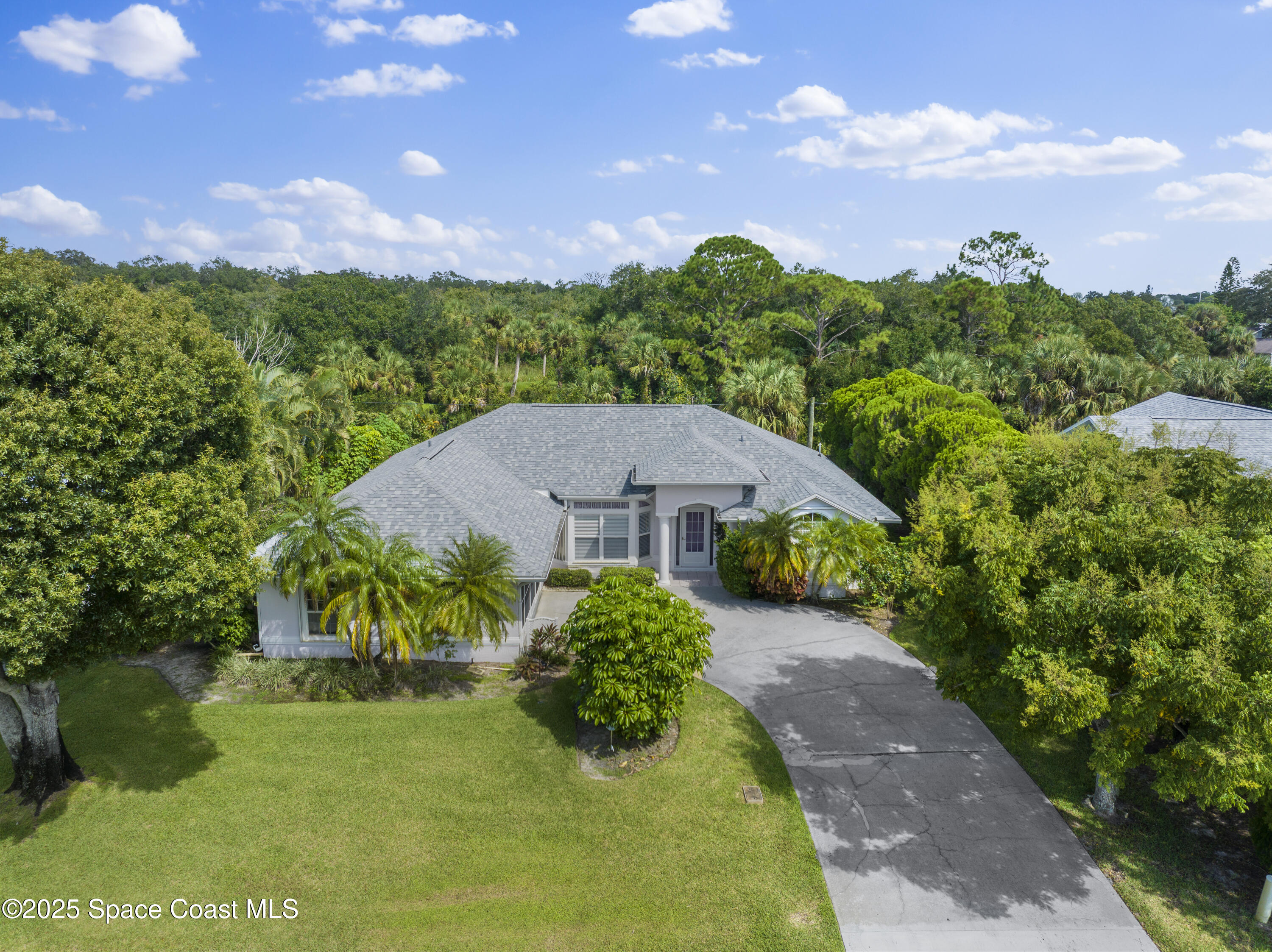1253 George Street Sebastian, FL 32958 - Photo 31 of 37 a view of a garden with a house in the background