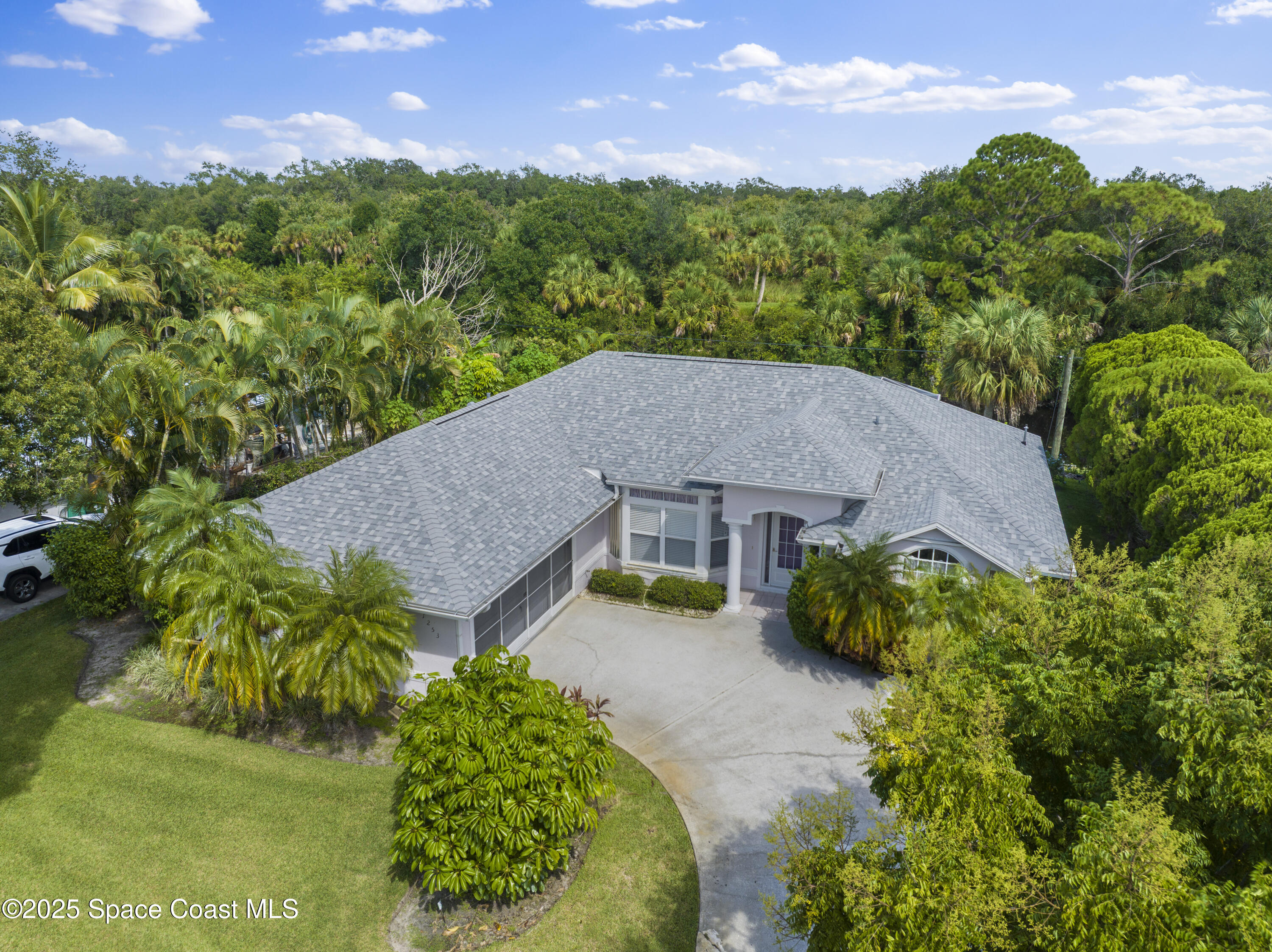 1253 George Street Sebastian, FL 32958 - Photo 36 of 37 a aerial view of a house with a yard and plants