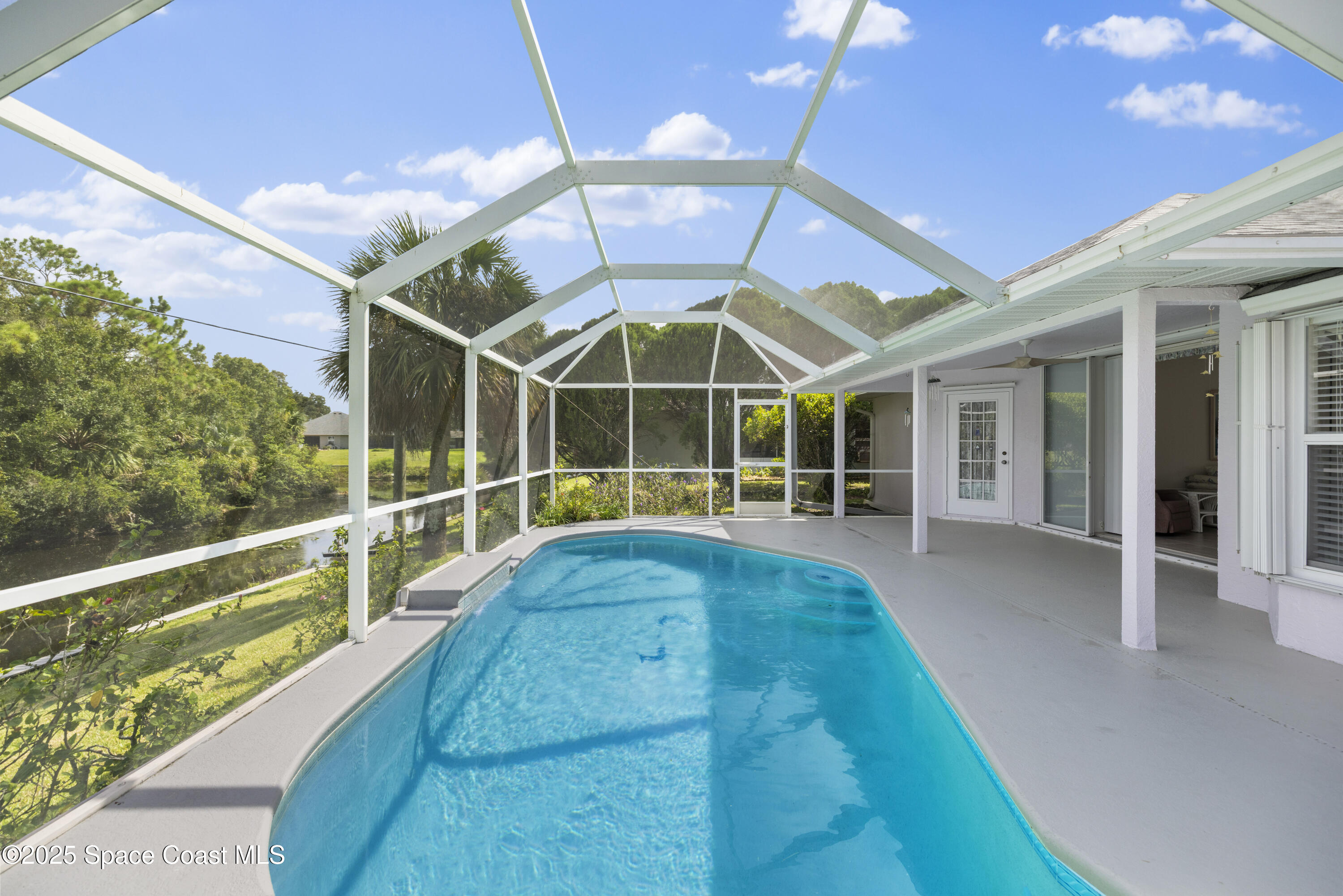 1253 George Street Sebastian, FL 32958 - Photo 4 of 37 a view of a house with a swimming pool