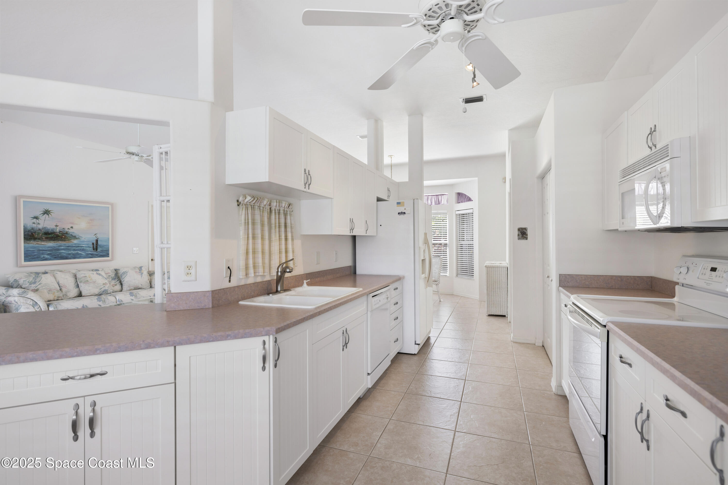 1253 George Street Sebastian, FL 32958 - Photo 6 of 37 a spacious bathroom with a granite countertop sink mirror and a shower