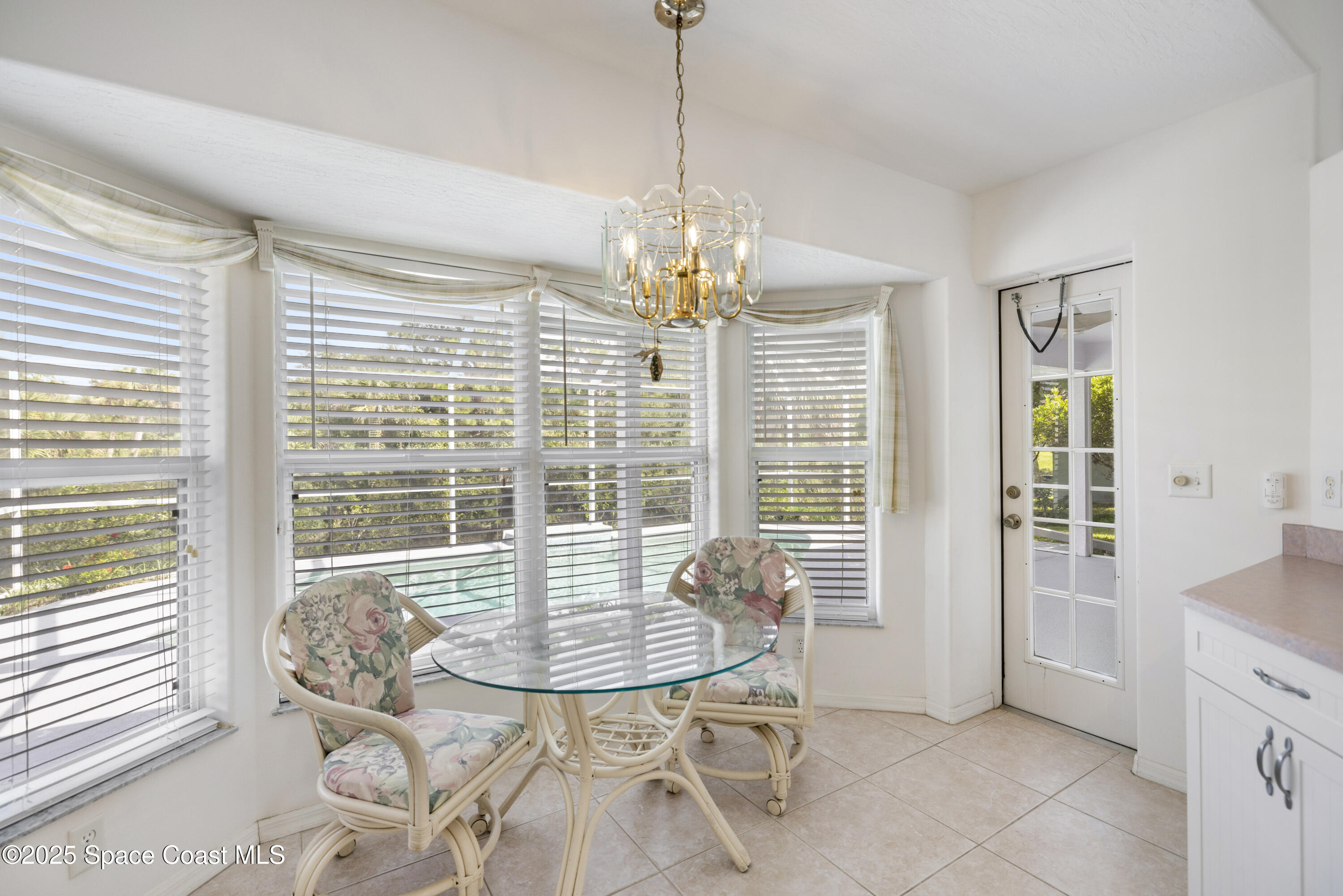 1253 George Street Sebastian, FL 32958 - Photo 8 of 37 a view of a dining room with furniture window and outside view