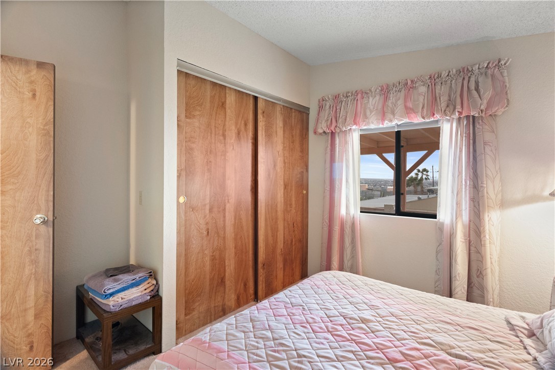 1609 Cajon Court Laughlin, NV 89029 - Photo 28 of 69 Second Bedroom with a closet and a textured ceiling