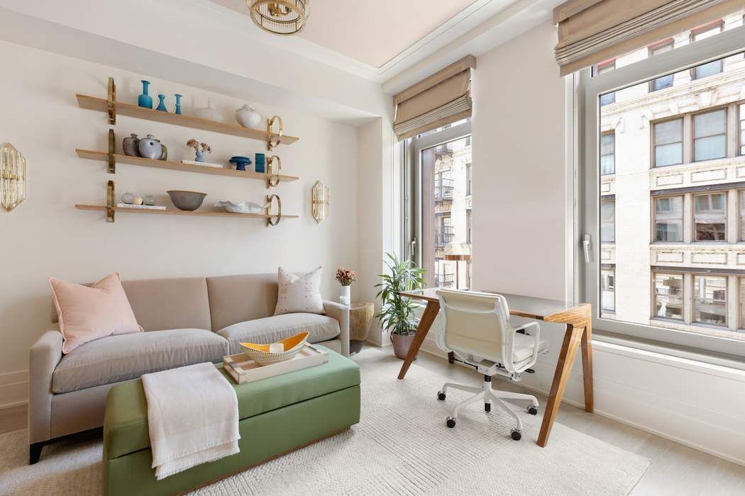 40 Bleecker Street, Unit 5D Manhattan, NY 10012 - Photo 6 of 17 a living room with furniture and a window