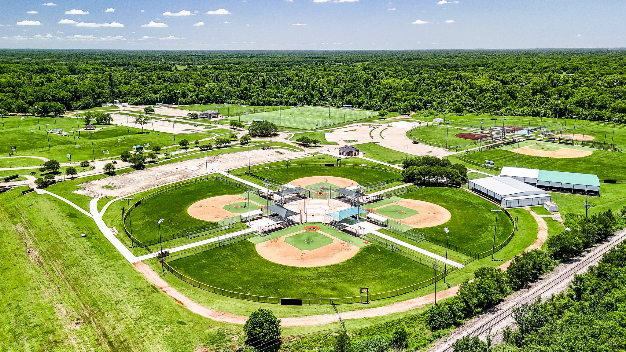 10306 Rudolph Court Missouri City, TX 77459 - Photo 30 of 34 Take advantage of world-class active living at the Camp Sienna Sports Complex, a massive 160-acre premier sports and recreational destination located right within the Sienna master-planned community.