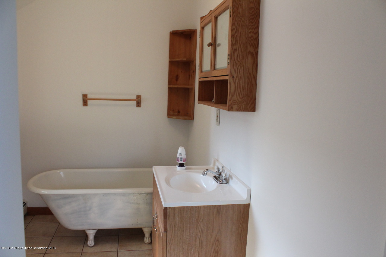 826 Ridge Road Telford, PA 18969 - Photo 10 of 20 a bathroom with a sink and a mirror