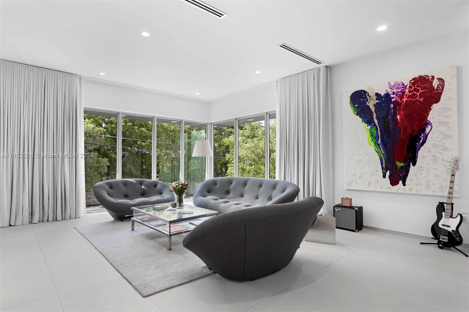 1701 Southwest 4th Avenue Miami, FL 33129 - Photo 16 of 32 a living room with furniture and a large window