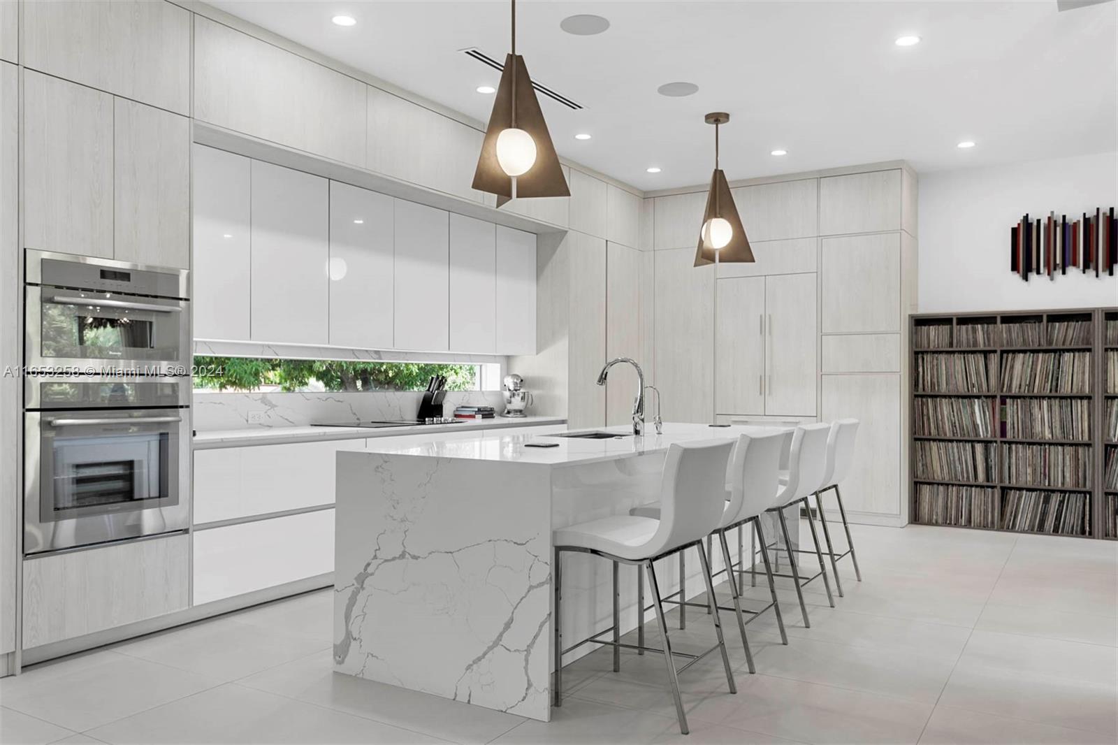 1701 Southwest 4th Avenue Miami, FL 33129 - Photo 20 of 32 a kitchen with a sink cabinets and window