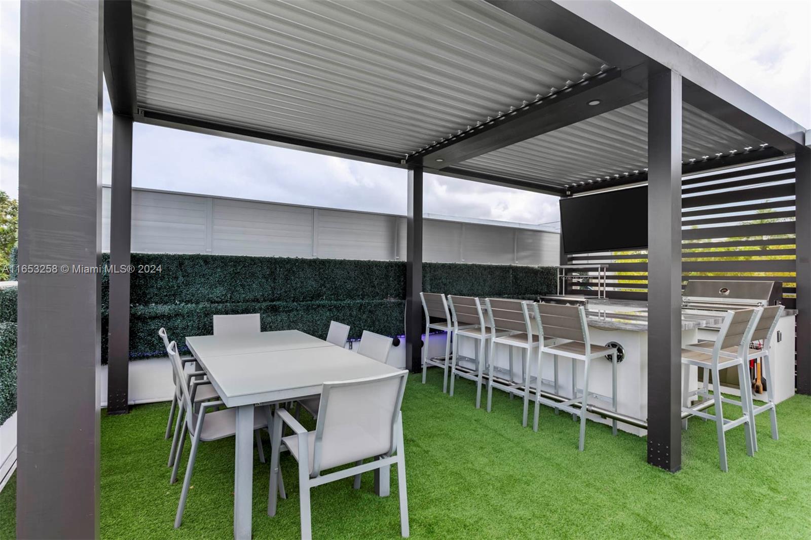 1701 Southwest 4th Avenue Miami, FL 33129 - Photo 28 of 32 a balcony with table and chairs