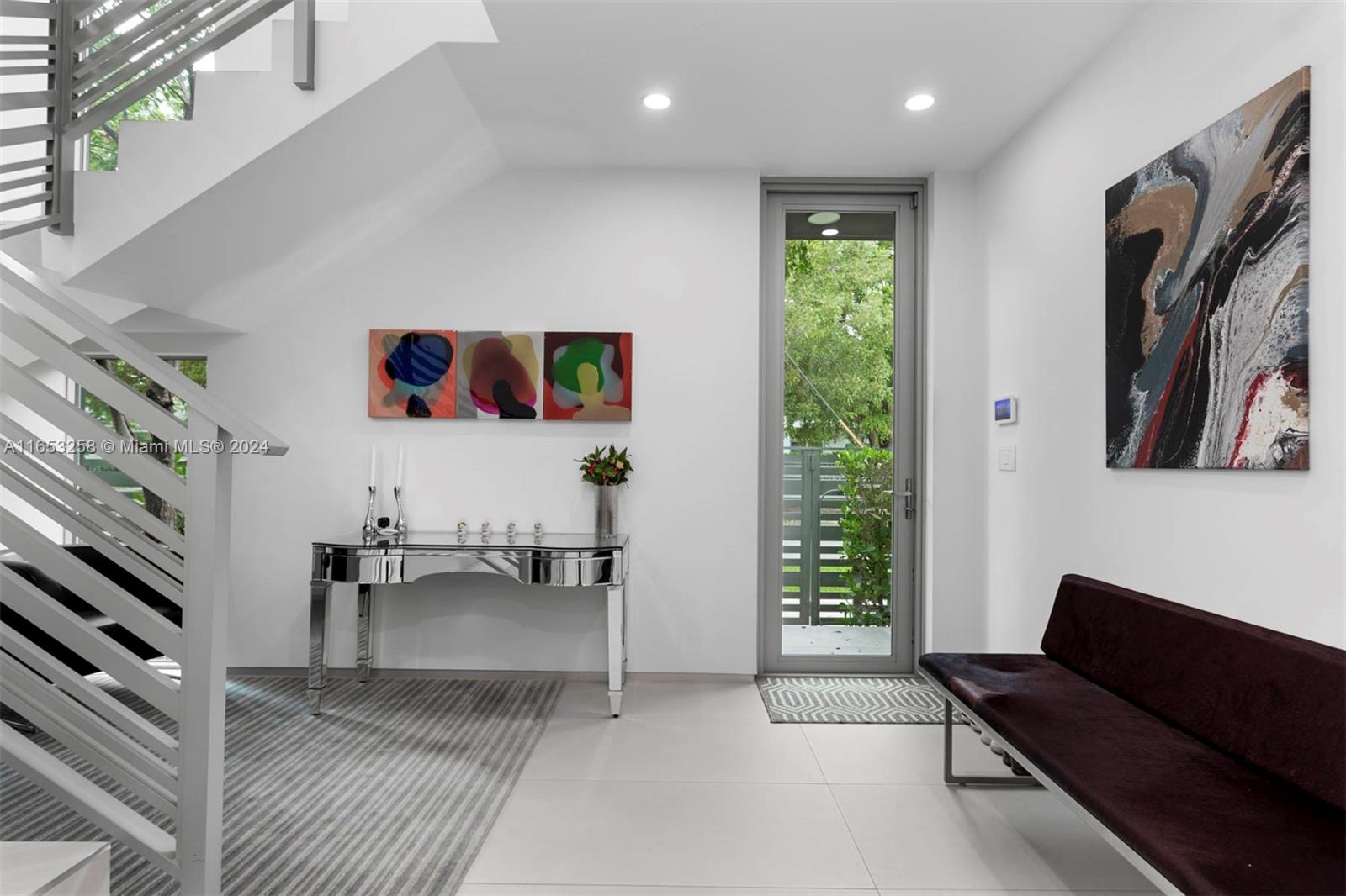 1701 Southwest 4th Avenue Miami, FL 33129 - Photo 4 of 32 a living room with furniture and a couch