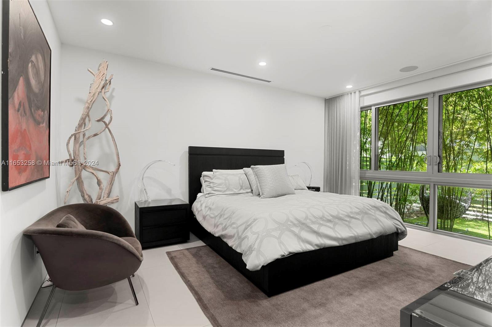 1701 Southwest 4th Avenue Miami, FL 33129 - Photo 6 of 32 a bedroom with a bed and a window