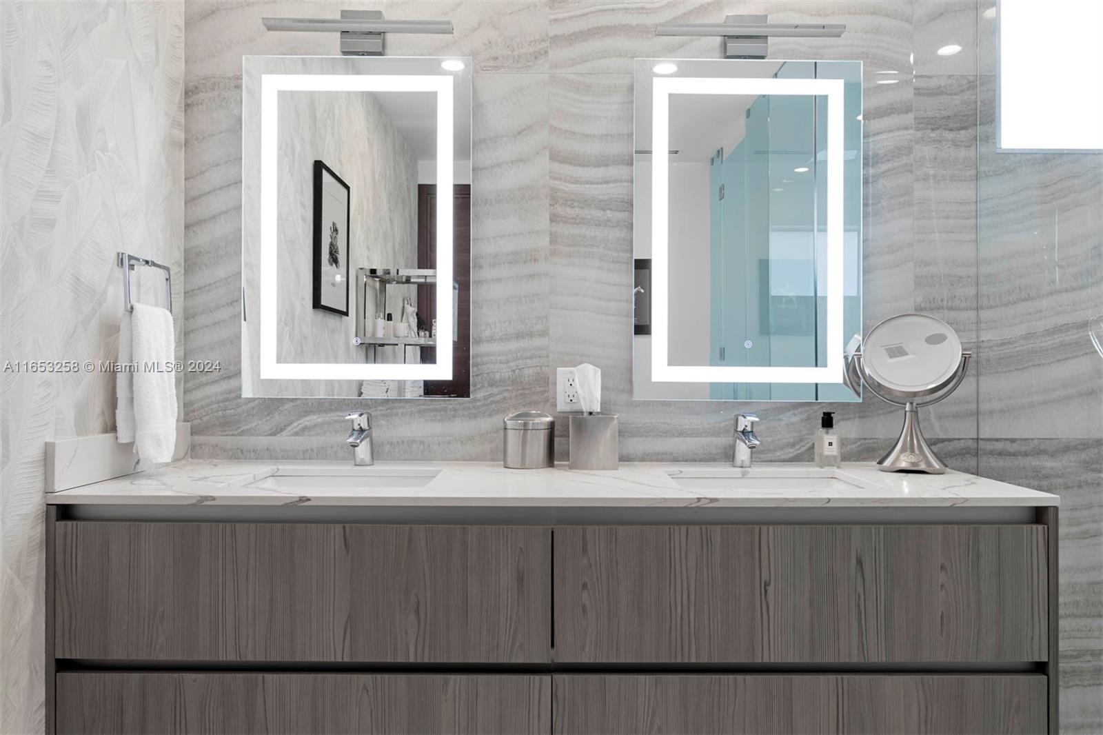 1701 Southwest 4th Avenue Miami, FL 33129 - Photo 8 of 32 a bathroom with a double vanity sink and a mirror