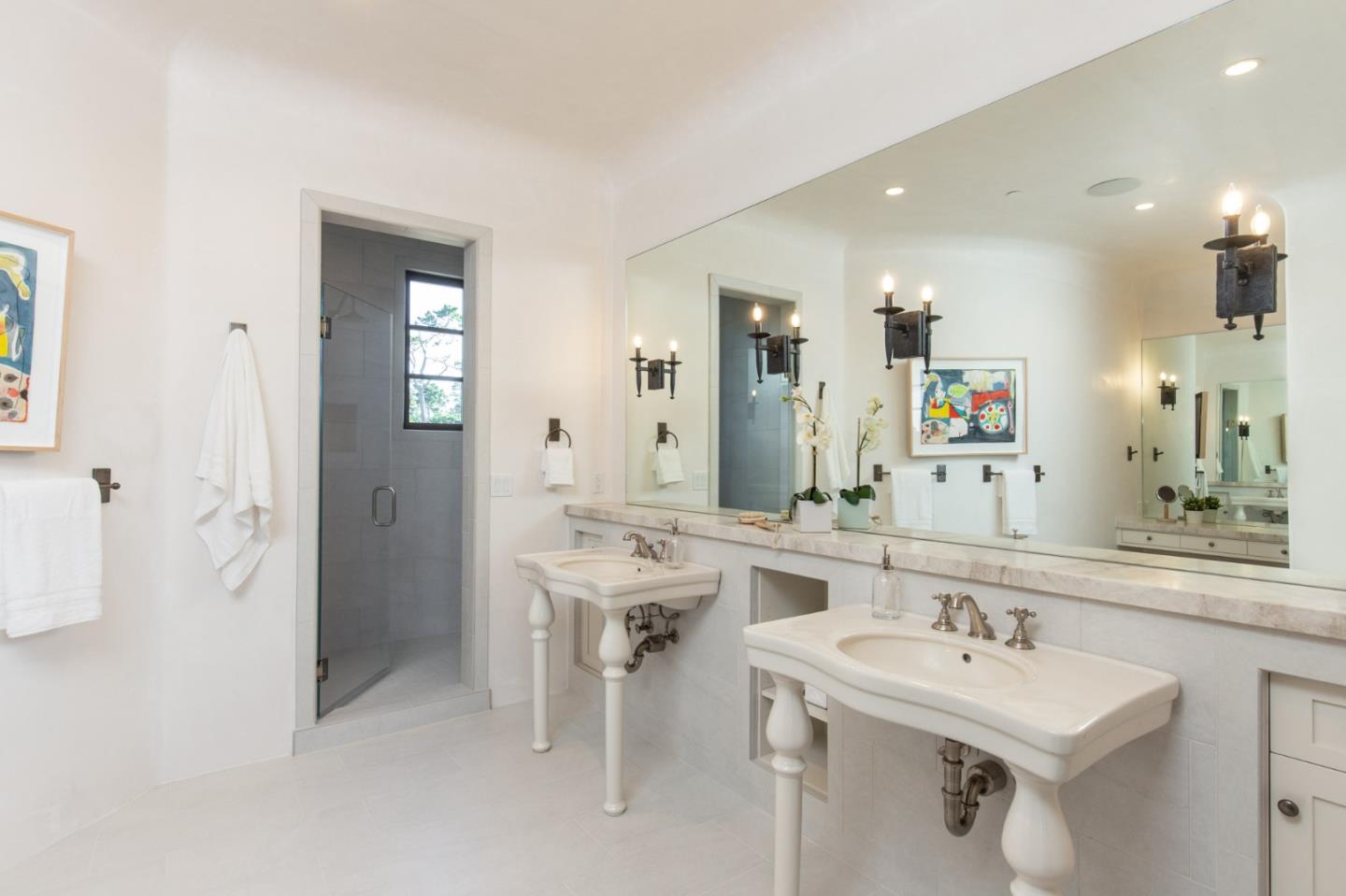 1605 Sonado Road Pebble Beach, CA 93953 - Photo 27 of 33 a bathroom with a sink a toilet and a mirror