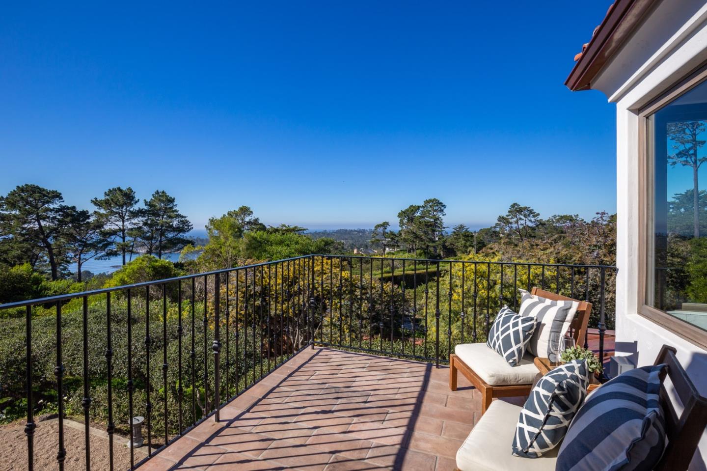 1605 Sonado Road Pebble Beach, CA 93953 - Photo 30 of 33 a view of a balcony with chairs