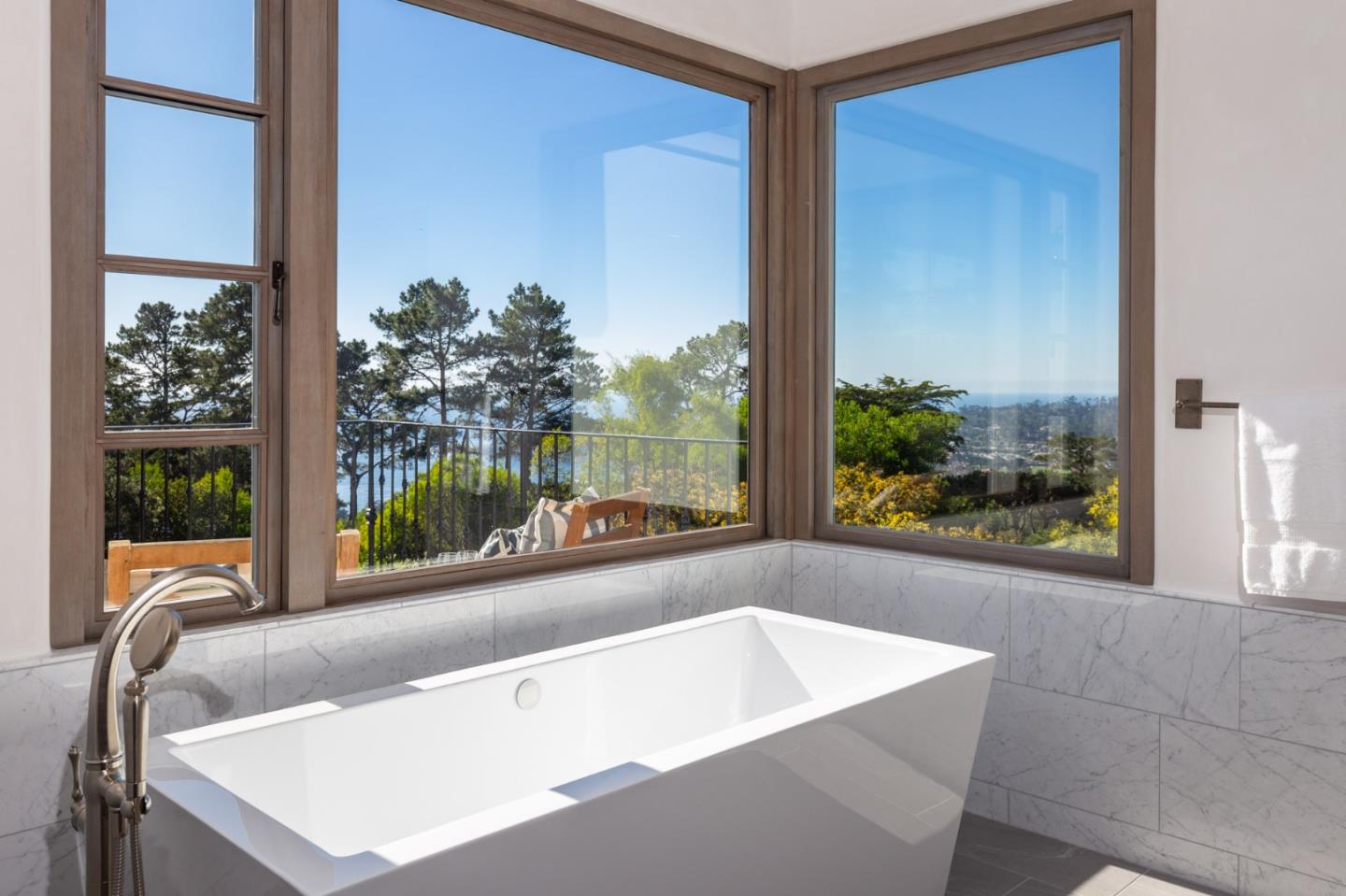 1605 Sonado Road Pebble Beach, CA 93953 - Photo 33 of 33 a living room with a large window and front table