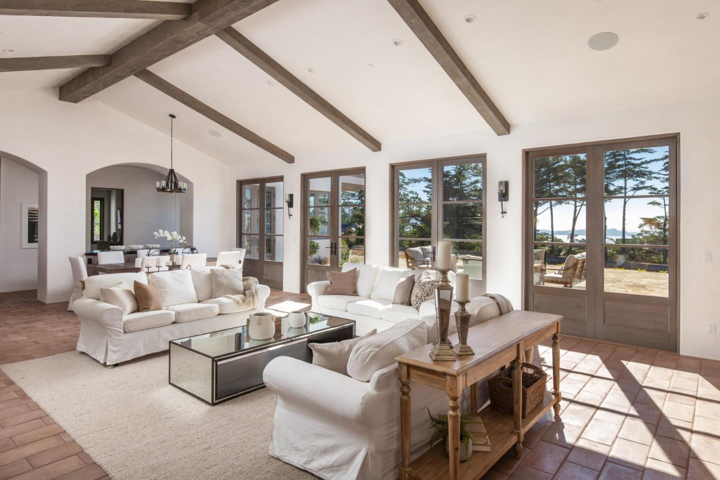 1605 Sonado Road Pebble Beach, CA 93953 - Photo 8 of 33 a living room with furniture and large windows