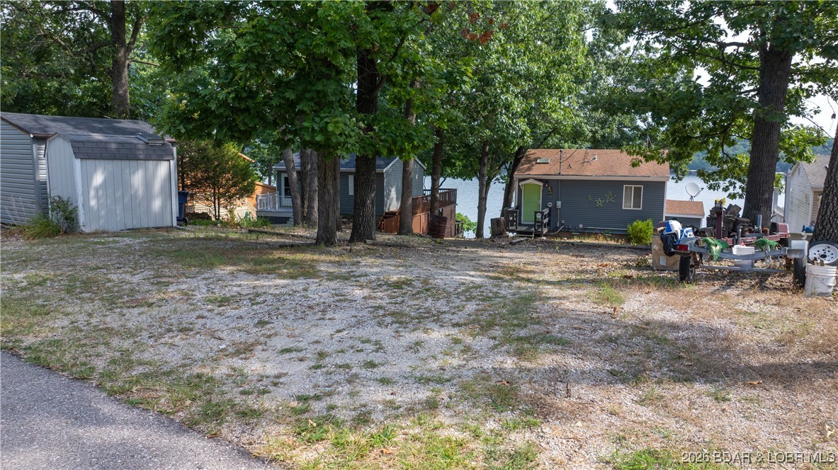 2859 Twin Rivers Point Camdenton, MO 65020 - Photo 25 of 30 Loads of flat parking and room for garage or shed!