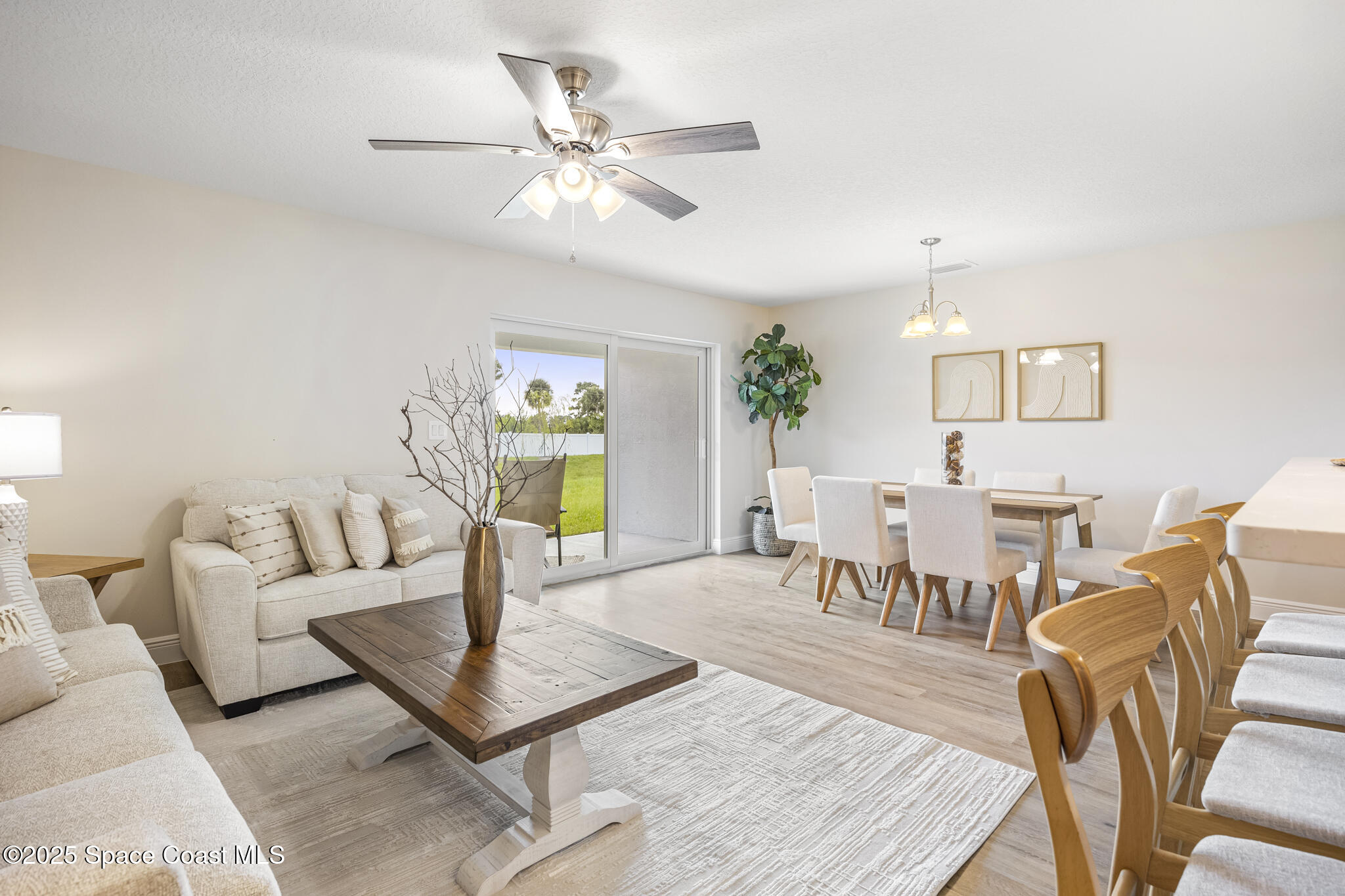 208-238 Hidden Wds Place Melbourne, FL 32901 - Photo 30 of 35 Staged - Middle Unit Living Area