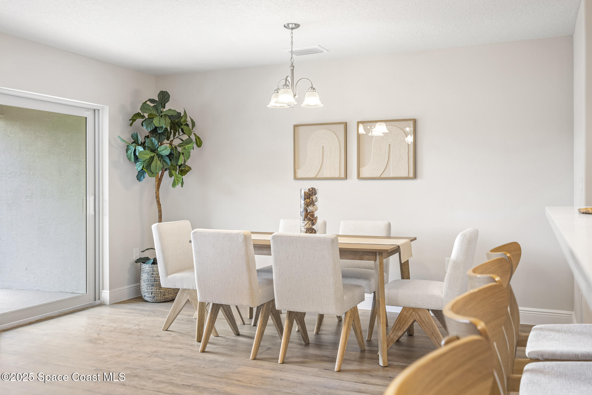 208-238 Hidden Wds Place Melbourne, FL 32901 - Photo 31 of 35 Staged - Middle Unit Dining Area