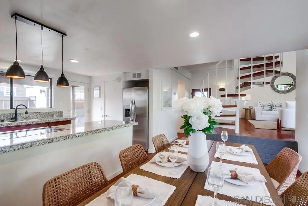 141 Sea Cliff Way Del Mar, CA 92014 - Photo 14 of 65 a living room with furniture wooden floor and a large window