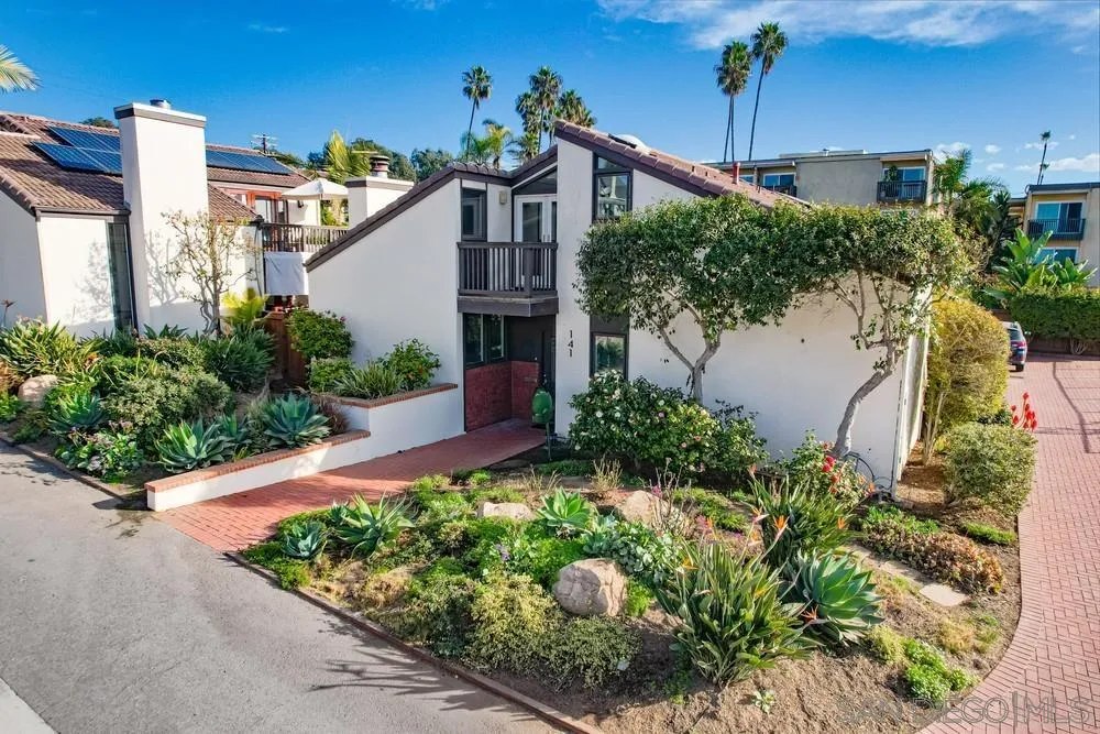 141 Sea Cliff Way Del Mar, CA 92014 - Photo 2 of 65 a front view of a house with garden