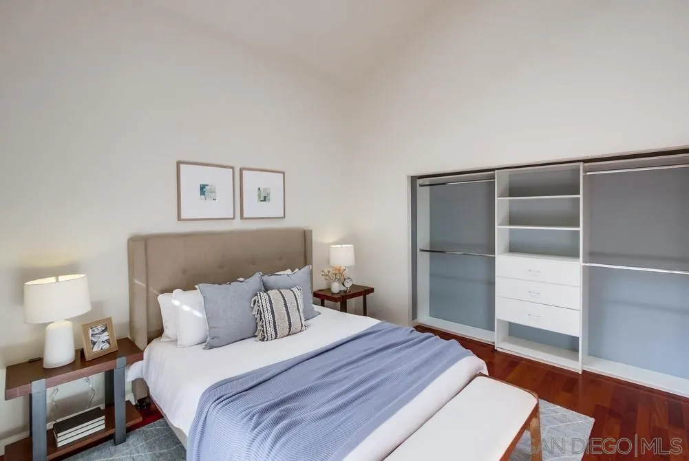 141 Sea Cliff Way Del Mar, CA 92014 - Photo 22 of 65 a bedroom with a bed and a walk in closet