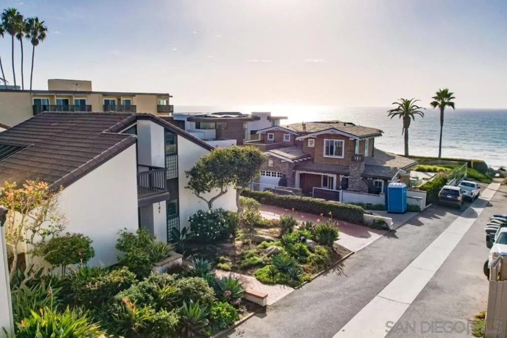 141 Sea Cliff Way Del Mar, CA 92014 - Photo 3 of 65 a view of a house with a yard and potted plants