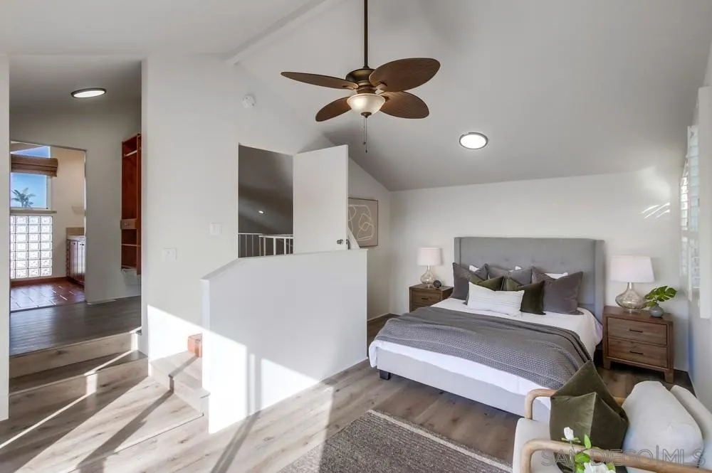 141 Sea Cliff Way Del Mar, CA 92014 - Photo 36 of 65 a bedroom with a bed and a large mirror