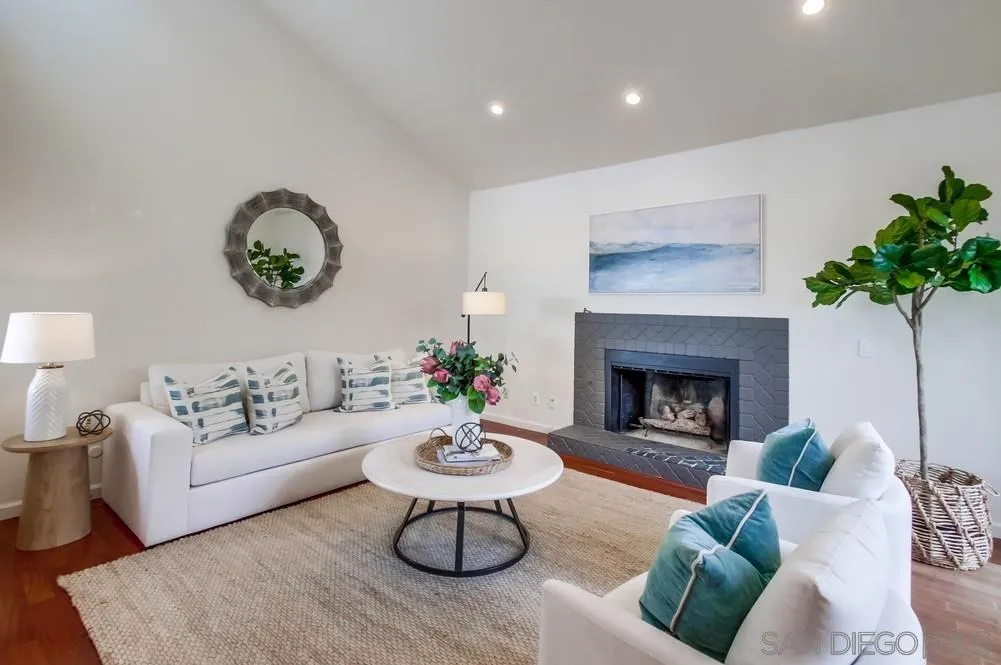 141 Sea Cliff Way Del Mar, CA 92014 - Photo 6 of 65 a living room with furniture and a fireplace