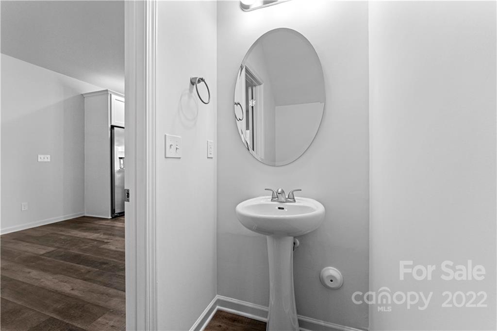 808 McDonald Road Charlotte, NC 28214 - Photo 15 of 30 a bathroom with a sink mirror and shower