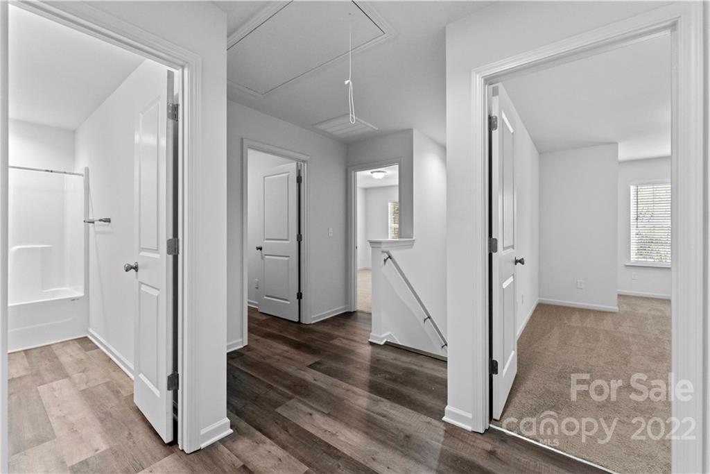 808 McDonald Road Charlotte, NC 28214 - Photo 17 of 30 a view of a hallway with wooden floor and entryway