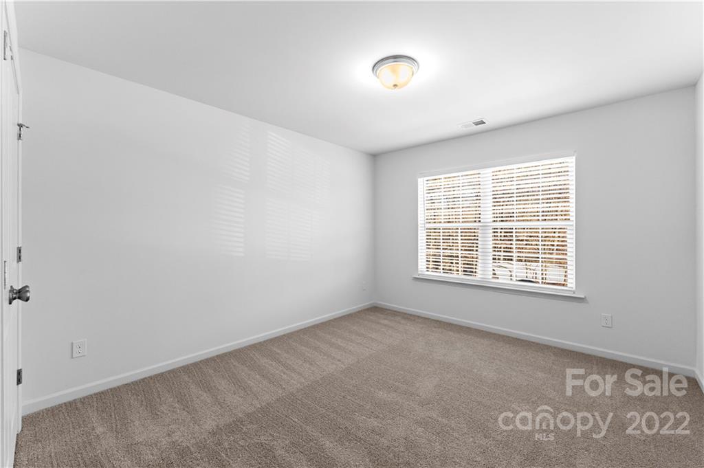 808 McDonald Road Charlotte, NC 28214 - Photo 18 of 30 a view of an empty room with a window