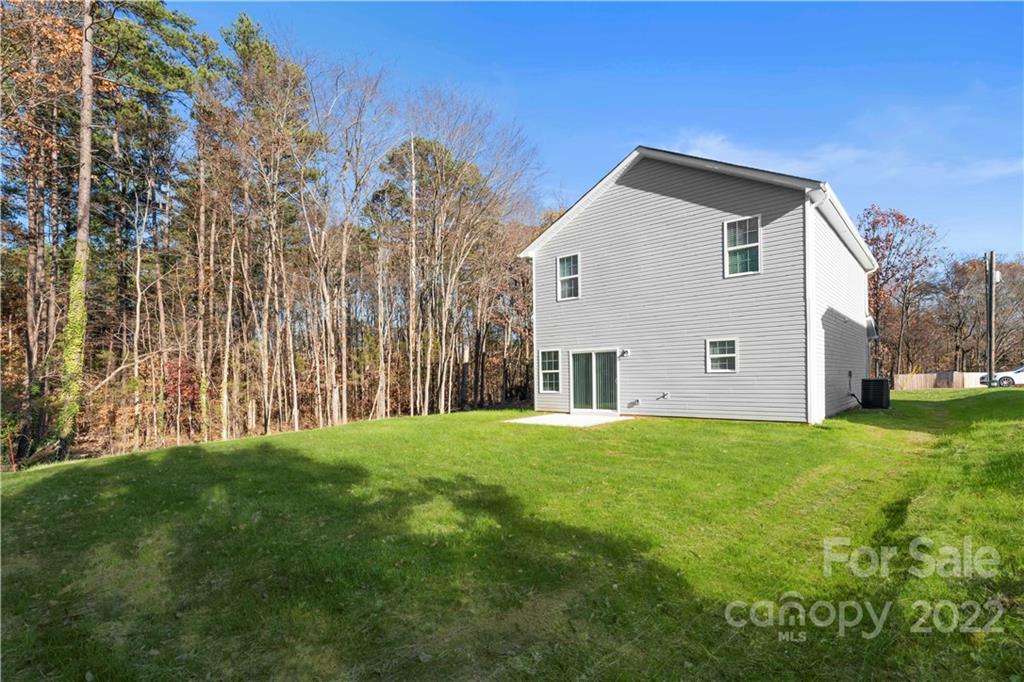808 McDonald Road Charlotte, NC 28214 - Photo 27 of 30 a view of a house with backyard and garden