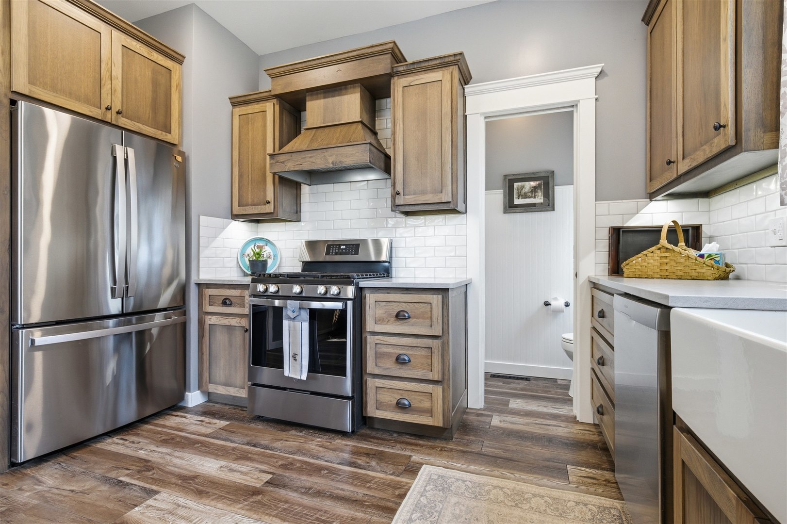 616 East Madison Street Pontiac, IL 61764 - Photo 12 of 37 a kitchen with stainless steel appliances granite countertop a refrigerator sink and stove