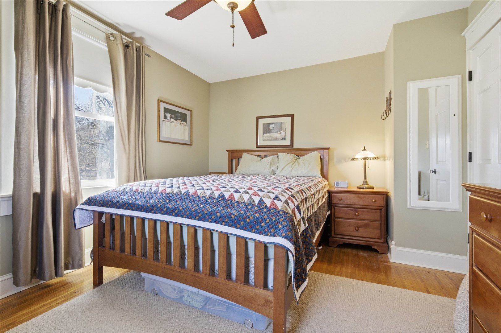 616 East Madison Street Pontiac, IL 61764 - Photo 19 of 37 a bedroom with a bed and wooden floor