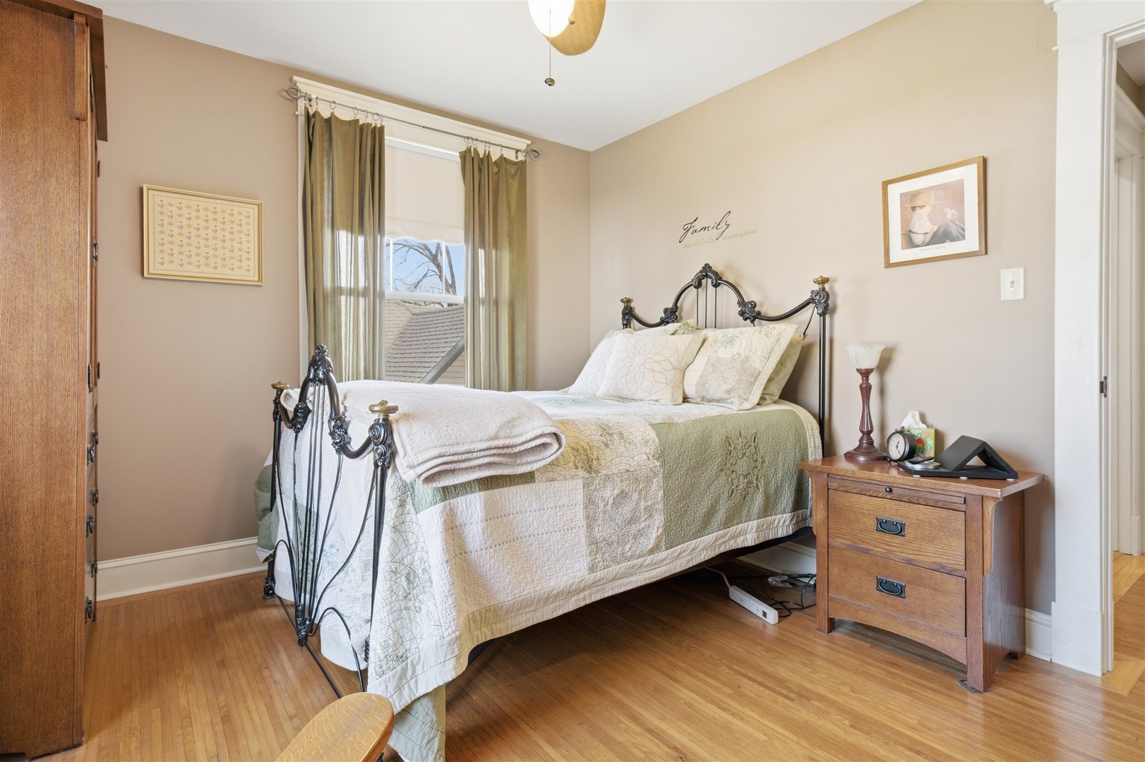 616 East Madison Street Pontiac, IL 61764 - Photo 22 of 37 a bedroom with a bed and wooden floor