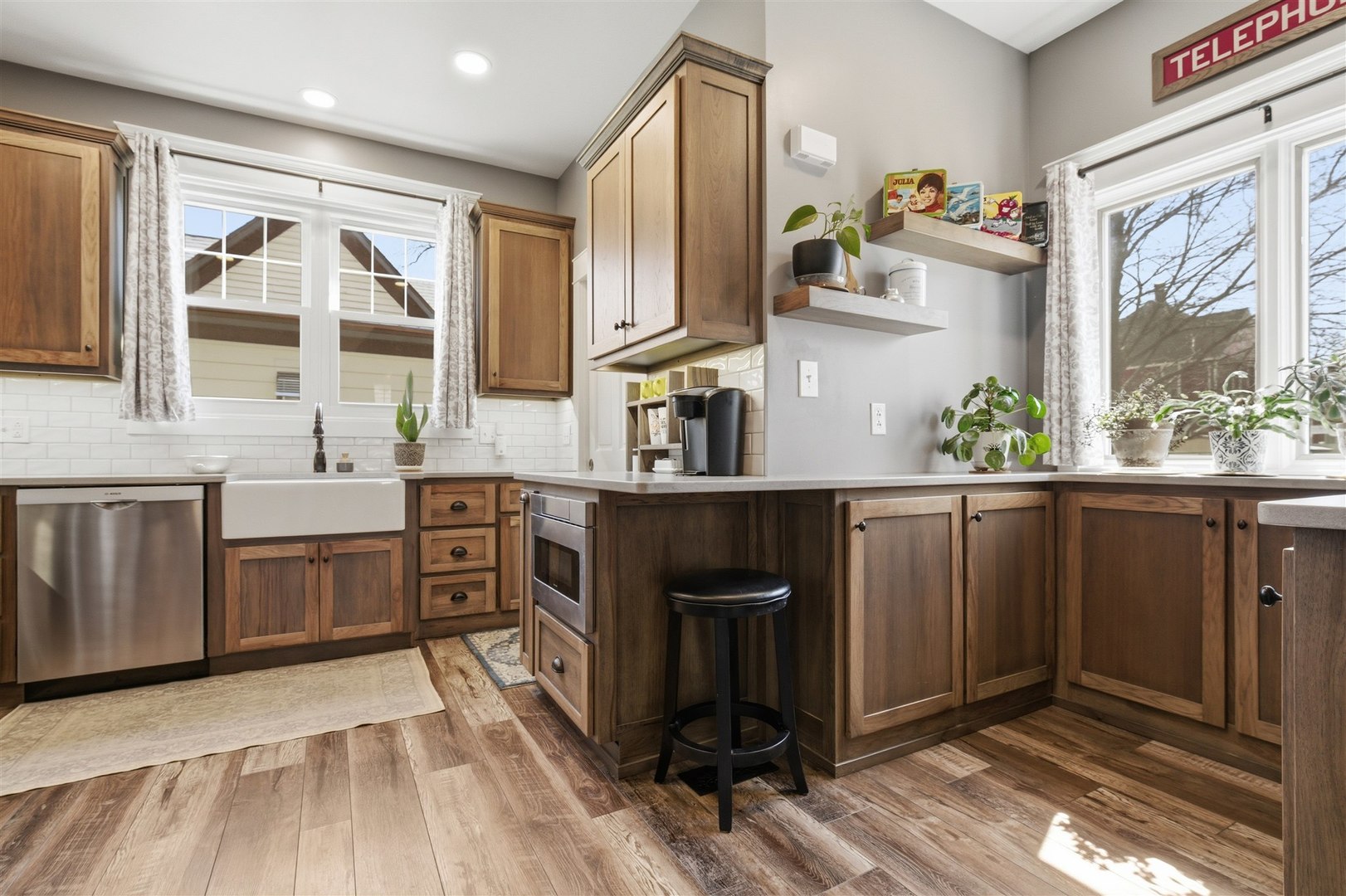 616 East Madison Street Pontiac, IL 61764 - Photo 10 of 37 a open kitchen with stainless steel appliances granite countertop a stove a sink and a refrigerator
