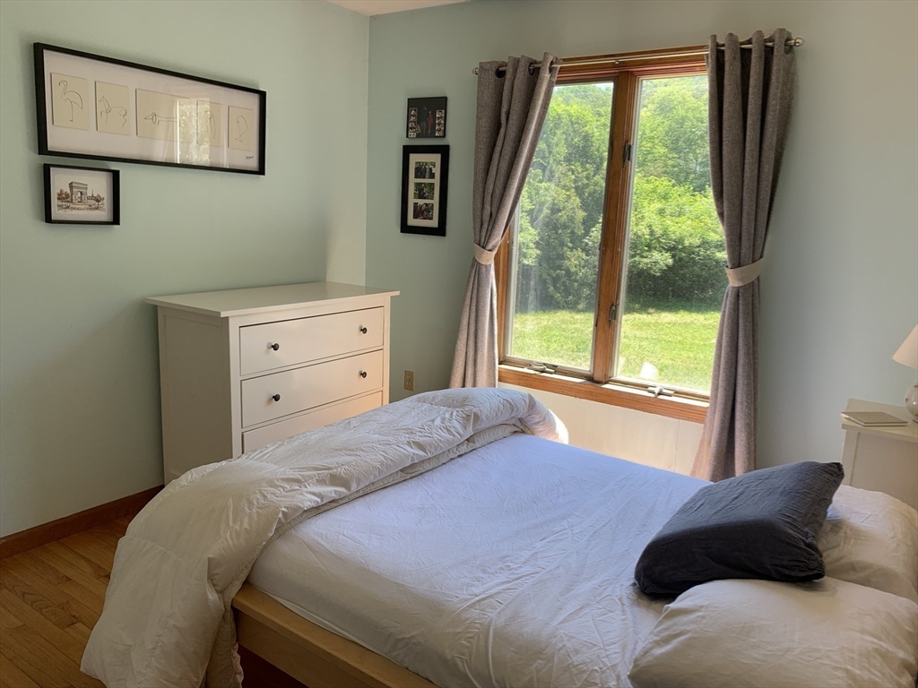 75 State Street Amherst, MA 01002 - Photo 19 of 39 a bedroom with a bed and a window