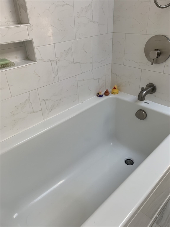 75 State Street Amherst, MA 01002 - Photo 26 of 39 a bathroom with a tub and a sink