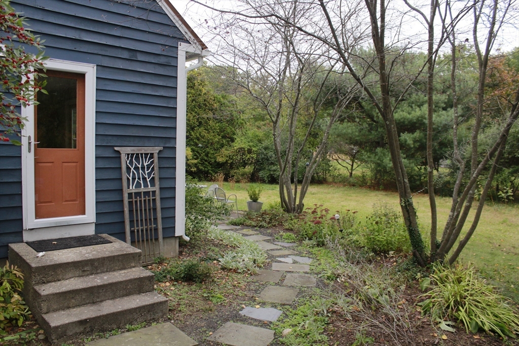 75 State Street Amherst, MA 01002 - Photo 4 of 39 a backyard of a house with lots of green space