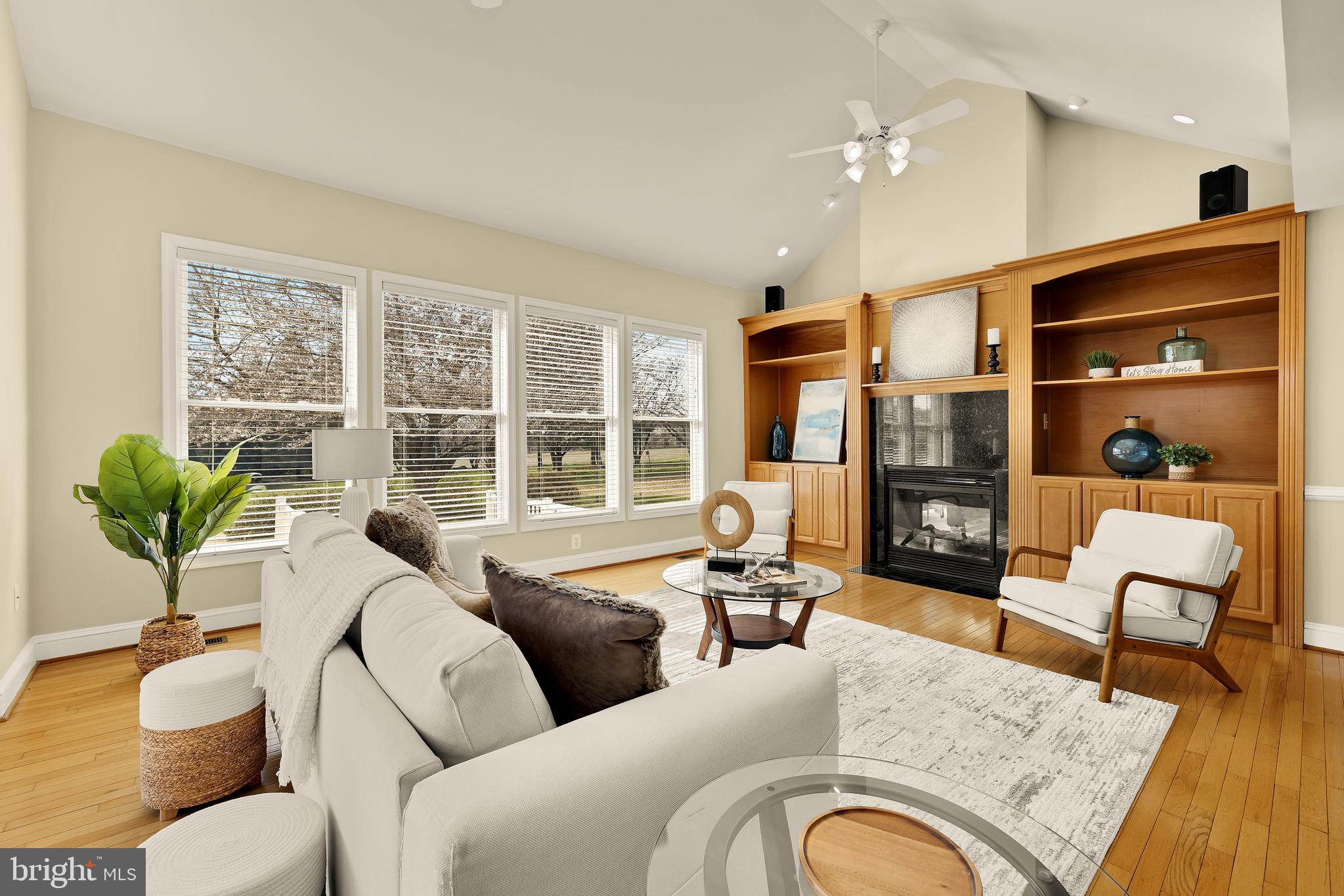 20407 Peach Tree Road Dickerson, MD 20842 - Photo 15 of 53 a living room with furniture fireplace and a large window