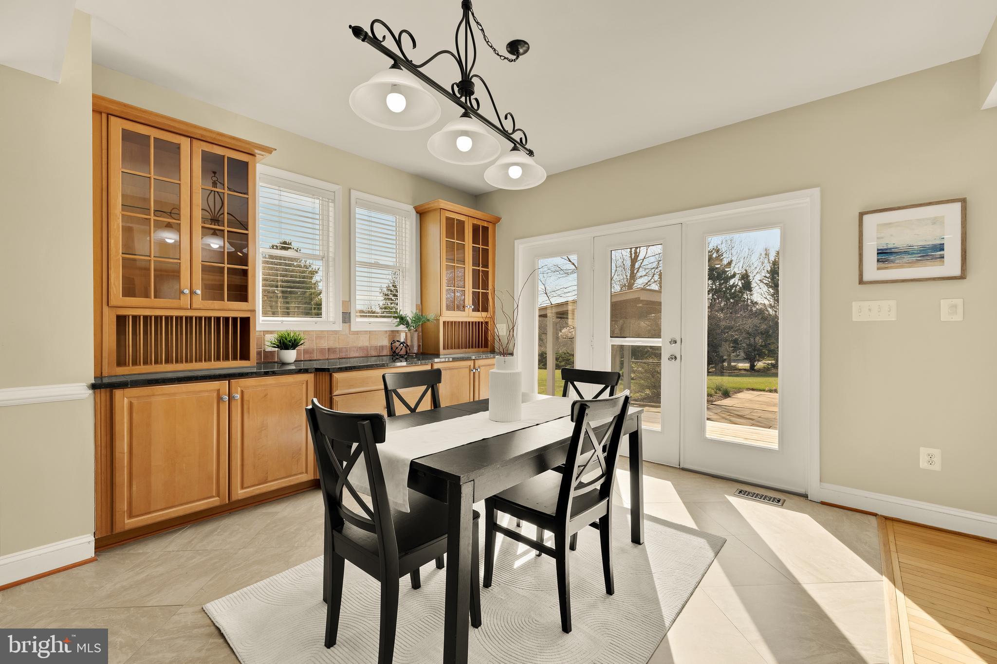 20407 Peach Tree Road Dickerson, MD 20842 - Photo 17 of 53 a view of a dining room with furniture window and outside view